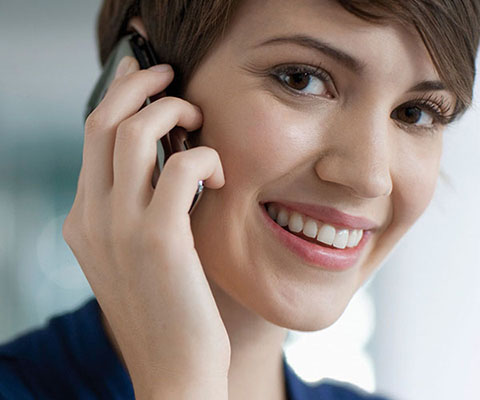 Smiling woman on the phone